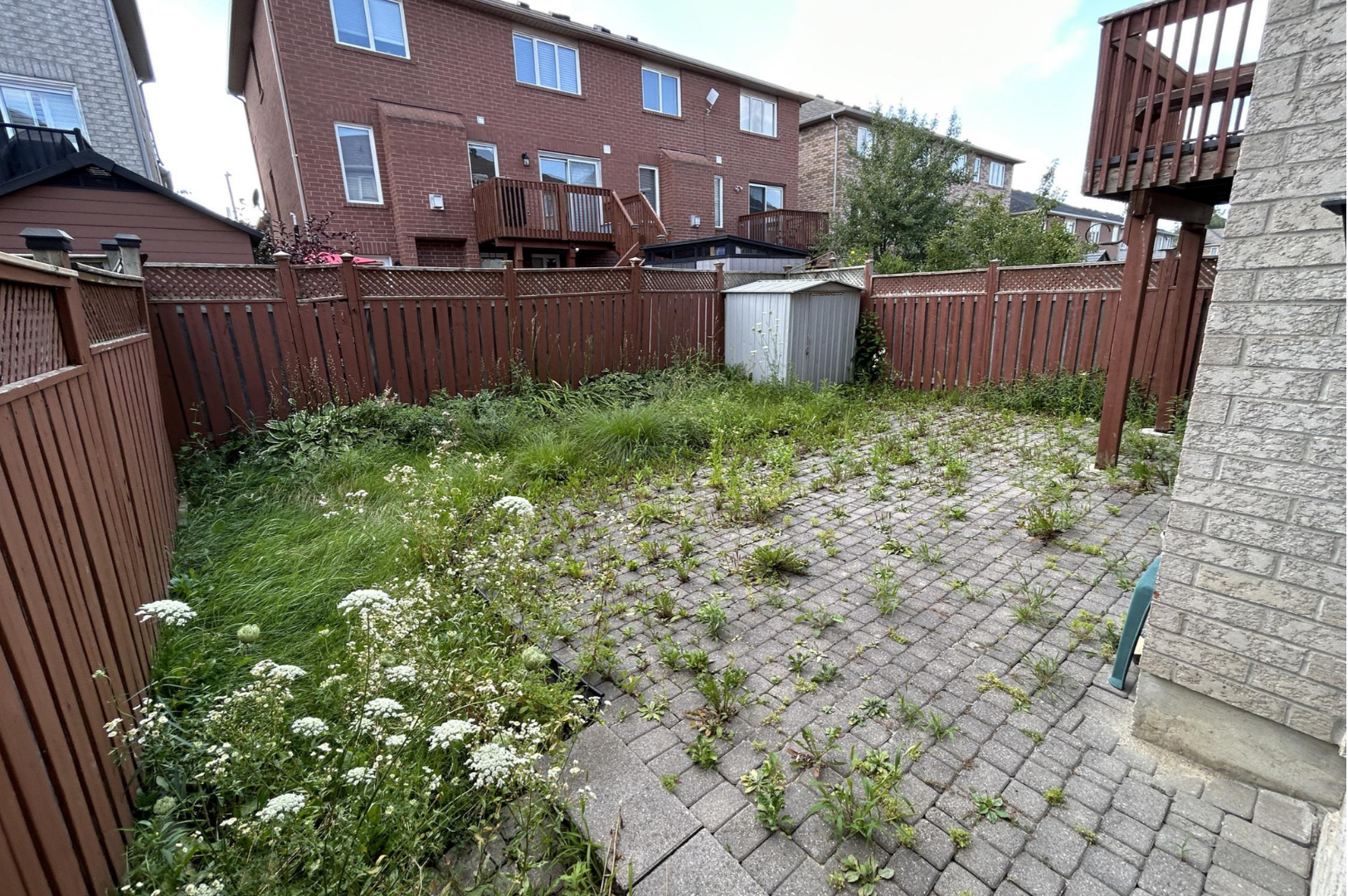 Cluttered garage before move-out